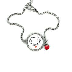 a necklace with a dog's head and heart on it