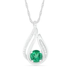 This 6.0mm lab-created emerald and 1/15 ct. t.w. diamond and beaded open flame-style pendant is set in sterling silver. The design slides along an 18.0-inch rope chain that secures with a spring-ring clasp. Diamond Pendants Designs, Lab Created Emerald, Peoples Jewellers, Emerald Stone, Jewelry Repair, Precious Jewelry, Pendant Design, Necklace Designs, Stone Pendants