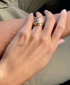 Conservative Tattoo Placement, Wedding Hand Tattoos, Tattooed Ring Finger, Initial Tattoo Hand, Cursive H Tattoo, Initial Hand Tattoo, Tattoo Couple Aesthetic, Married Tattoos, Name Tattoos For Women