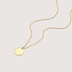 The Chiara necklace is a light gold round disc necklace that you just NEED. Wheather you wear it alone or stacked, with your another necklace or bare alone- it's perfect. Add a personal touch to your Chiara necklace with an engraved portrait of a loved one on one side and their name engraved on the opposite side. If you can dream it- we can make it happen. All features can be customized! Talk to us, we love making custom designs. Our jewelry is carefully handmade in our atelier To order by phone call +972(0)722991000 Elegant Sterling Silver Round Disc Coin Necklace, Yellow Gold Sterling Silver Medallion Necklace, Sterling Silver Yellow Gold Medallion Necklace, Everyday Yellow Gold Coin Necklace, Modern 14k Gold Round Pendant Necklace, Dainty Round Cable Chain Necklaces, Dainty Necklace With Cable Chain, Elegant Yellow Gold Circle Necklace, Everyday Round Medallion Necklace Tarnish Resistant