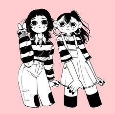 two girls in black and white striped shirts standing next to each other with their arms around one another