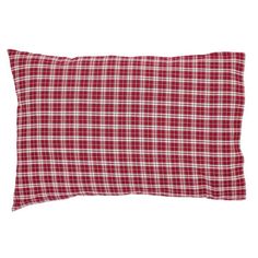 a red and white plaid pillow on a white background