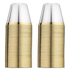 two gold - plated vases are sitting side by side on a white background