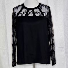 New York & Company Blouse Black Sheer Black Lace Sleeves & Upper Bodice Keyhole Back Button Closure Rounded Neckline Pullover Style Long Sleeves Body: 100% Polyester Lace: 100% Nylon Size Medium 20 Inches Flat Across Bust 25.5 Inches Long 24 Inch Sleeves Measurements Are Also In The Photos No Holes Stains Or Damage Perfect Nwt Condition Smoke Free Pet Free Home Sleeves Blouse, Lace Neckline, Rounded Neckline, Blouse Black, Lace Sleeves, Sheer Lace, Black Blouse, Pullover Styling, Round Neckline