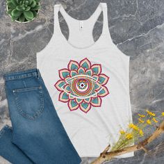 Introducing our vibrant Flower Mandala Tank Top, where spirituality meets style! 🌼👁️ 🌟 Embrace the mystical allure of the All Seeing Eye as it takes center stage on this stunning Mandala tank top. 🌼 Crafted with care, this Meditation Shirt is more than just apparel; it's a statement of your inner journey and a celebration of your unique style. Our Alternative Fashion piece is designed to bring positive vibes into your life, making it perfect for yoga sessions, meditation, or simply as Trippy Multicolor Yoga Tops, Casual Multicolor Tank Top For Yoga, Bohemian Summer Tops For Meditation, Hippie Printed Festival Tops, Hippie Yoga Tops For Summer, Hippie Printed Tops For Festivals, White Graphic Print Top For Festival, Cotton Yoga T-shirt For Summer, Summer Yoga Cotton T-shirt