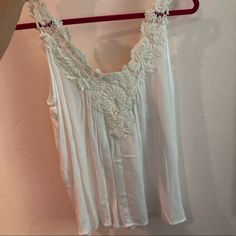 Cute White Top With Tag Still Attached. Price Is Marked Out Because It Probably Was A Gift. I’ve Never Worn It! White Feminine Tank Top With Lace Trim, White Feminine Camisole Tank Top, White Tank Top With Lace Trim, White Feminine Tank Top, White Lace Camisole Tank Top, White Feminine Camisole, Feminine White Sleeveless Tops, White Feminine Sleeveless Tank Top, White Sleeveless Camisole For Vacation