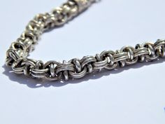 Beautifully 925 sterling silver double round link chain bracelet, with detailing at both ends of bracelet, encompassing the loop and bar clasps. This item has a Toggle clasp, and is lightweight bracelet. Bracelet weighs 17.2 grams.  Hallmarked in the UK. Two differing lengths available.  Please note - measurements of length are taken from the top of the loop clasp to the bar end, width is the actual link size not including end clasp holdings. Silver Link Bracelets With Rolo Chain, Classic Silver Rolo Chain Bracelet, Sterling Silver Rolo Chain Bracelet, Classic Sterling Silver Bracelet With Hook And Links, Silver Oval Link Box Chain Bracelet, Silver Sterling Chain Bracelet With Hooks And Links, Silver Oval Link Chain Bracelet With Hook, Chain Silver, Bracelet Argent