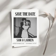 save the date card with an image of a man and woman on it next to a flower