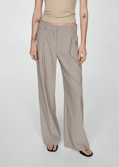 Pinstripe suit pants - Woman | MANGO USA Business Casual Wide-leg Striped Pants, Business Casual Wide-leg Pants With Vertical Stripes, Pinstriped Wide-leg Pants For Business Casual, Pinstripe Wide-leg Pants For Business Casual, Striped Wide-leg Pants For Business Casual, Pinstripe Wide Leg Bottoms For Business Casual, Business Casual Wide-leg Striped Bottoms, Vertical Stripes Wide-leg Pants For Business Casual, Business Casual Wide-leg Bottoms With Vertical Stripes