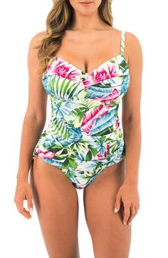 Get the comfort and support you need at the beach or pool in this floral-print tankini top featuring underwire cups, powermesh side wings and ruched side ties. Adjustable straps Drawstring ruching Power-net-lined side wings for support Lined, with soft foam cups 80% polyamide, 20% elastane Hand wash, line dry Imported Underwire Tankini With Built-in Cups For Pool, Underwire Floral Print Swimwear, Floral Print Underwire Swimwear, Fitted Tropical Tankini For Beach Season, Fitted Tropical Print Tankini For Beach Season, Spring Swimwear With Padded Cups And Spaghetti Straps, Spring Swimwear With Spaghetti Straps And Padded Cups, Padded Cups Tankini For Pool And Beach, Padded Cups Tankini For Beachwear