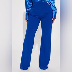 Elevate Your Work Wardrobe With These Stunning Victoria High-Waisted Dress Pants From Fashion Nova. Crafted From Premium Quality Materials, These Pants Are Designed To Offer Exceptional Comfort And Style. The Pants Feature A Flattering Fit That Accentuates Your Curves And Flatters Your Figure, While The Blue Color Adds A Touch Of Sophistication To Your Look. With A Regular Size Type And S Size, These Pants Are Perfect For Women Who Want To Make A Statement At Work Or Any Formal Occasion. The Pan Fitted Elastane Dress Pants For Summer, Blue Elastane Summer Pants, Blue Elastane Pants For Summer, Fitted Solid Color Bottoms For Work, Fitted Solid Color Dress Pants For Workwear, Fitted Workwear Bottoms In Solid Color, Elegant Solid Color Bottoms For Night Out, Chic Blue Solid Color Pants, Chic Solid Blue Pants