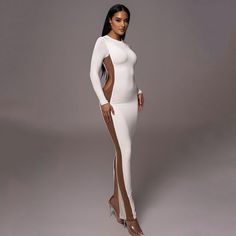 Features: Stay stylish and comfortable this autumn and winter with our Hollow Out Contrast Color Bodycon Maxi Dress for Women. With a new O neck design, long sleeves, and a sexy side split, you'll turn heads wherever you go. Made with high-quality materials, this dress is perfect for any occasion. White Long Sleeve Stretch Bodycon Dress, White Stretch Long Sleeve Bodycon Dress, White Long Sleeve Bodycon Dress For Fall, White Long Sleeve Dress For Night Out, White Long Sleeve Bodycon Dress For Club, Chic Long Sleeve High Stretch Bodycon Dress, Chic High Stretch Long Sleeve Bodycon Dress, Long Sleeve Bodycon Dress With Side Slits For Evening, Fitted Long Sleeve Bodycon Dress With Side Slits