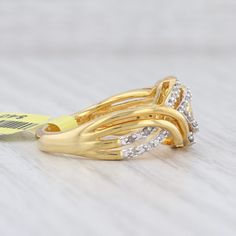 Gem: Natural Diamonds - 0.25 Total Carats, Single Cut, G - J Color, I1 - I3 Clarity Metal: Sterling Silver - Yellow Gold Plated (gold vermeil) Weight: 4.8 Grams Stamps: 925 Face Height: 10.5 mm Rise Above Finger: 5.1 mm This ring is a size 7. Please check our store as this ring may also be available in size 6 3/4. This ring is a size 52 / 6. Please check our store for more possible size options. Available Sizes (European / US): 52 / 6, 54 / 7, 56 / 7.5 Each piece is thoroughly examined and refin Diamond Weave, Rise Above, Knot Ring, Ring Sterling Silver, Sterling Ring, Gold Vermeil, Natural Diamonds, Sterling Silver Rings, Silver Gold