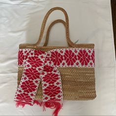 Straw Bag Handmade In Mexico With Ribbon Decor. Design Is White And Pink. (Picture Looks Red) Bag Measures 14x10x4. Never Worn.