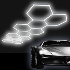 a futuristic car is shown in the dark