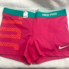 Nike Pro Workout Shorts Size Large New Without Tags Pink With Hot, Orange And Teal Accent The Tag Has Been Cut Out. I Do Not Know What The Shorts Are Made Out Of. 15 Inch Flat Waist Measurement. Dry Fit Never Worn Never Washed No Flaws Cute Running Outfit, Running Outfit, Nike Clothing, Hot Orange, Athletic Clothes, Waist Measurement, School Sports, Running Clothes