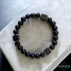 Movari's urban style with an edge. Sky's signature design incorporating 8mm matte Onyx, 3 Lava cubes and pure Copper bead stretch bracelet. This is an awesome statement piece with a fierce geometric vibe. Always makes an amazing gift! D E T A I L S △ Natural Stone: AAA Matte Onyx & Lava △ Bead Size: 8mm △ Real Copper △ Stretch Bracelet with strong elastic cord. △ Gemstone Meaning Card Included △ All natural stones can vary in patterns and shades to ensure it's an amazing original just like you! Mens Bead Bracelet, Gemstone Properties, Geometric Bracelet, Gemstone Meanings, Free Bracelet, Acid Reflux, Mens Beaded Bracelets, Lava Bead, Urban Style