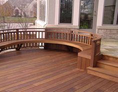 a wooden deck with benches on it