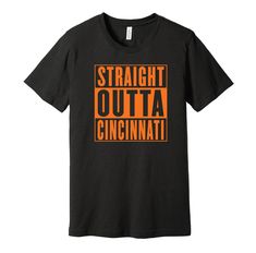 "Represent your Cincinnati pride with this awesome parody t-shirt showing where you're from. Whether you were born there, went to school there, or support the sports team, you or a friend/family member will love this super comfortable, high-quality tee. - Pre-Shrunk, Sized to Fit - 4.2oz, 100% Airlume Combed and Ring-Spun Cotton (Grey shirts are 90% cotton and 10% polyester) - Premium Shirt Brand, Great Quality Tee - Produced in the United States. - DTG Printing For Long-Lasting, Quality Look an Black Tri-blend T-shirt For Sports Events, Black Tri-blend T-shirt With Team Name, Funny Text Short Sleeve T-shirt For Sports Events, Black Fan Apparel Shirt With Text Print, Black Tri-blend T-shirt With Funny Text, Black Shirt With Text Print For Sports Events, Black Text Print Shirt For Sports Events, Black T-shirt With Funny Text For Sports Events, Black Screen Print Shirt For Sports Events