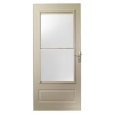 a white door with two panes and a mirror on the front side, against a white background