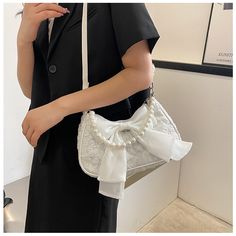 Brand Name: CyflymderHandbags Type: Shoulder BagsTypes of bags: Shoulder BagsMain Material: PolyesterLining Material: PolyesterShape: SquareOrigin: Mainland ChinaCN: HebeiHardness: SOFTPattern Type: FloralInterior: Interior Zipper PocketDecoration: BowExterior: NONEOccasion: VersatileClosure Type: zipperGender: WOMENStyle: FashionNumber of Handles/Straps: Single[23y 3m 8d] Feminine Bags With Pearl Handle For Everyday Use, Spring Pouch Bag, Elegant Shoulder Bag For Spring Gift, Feminine White Crossbody Bag, Feminine White Shoulder Bag As Gift, White Feminine Crossbody Bag, Spring White Bag With Pearl Handle, White Spring Bag With Pearl Handle, White Spring Bags With Pearl Handle