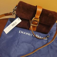 Suede Burgundy Dooney & Burke Nwt Mini Shoulder Bag Daily Satchel Saddle Bag With Branded Hardware, Daily Use Satchel Saddle Bag With Branded Hardware, Daily Use Saddle Satchel Bag With Branded Hardware, Daily Use Saddle Bag With Branded Hardware, Everyday Satchel Saddle Bag With Branded Hardware, Fall Brown Shoulder Bag With Branded Hardware, Fall Rectangular Shoulder Bag With Branded Hardware, Brown Crossbody Satchel With Dust Bag, Brown Saddle Bag With Branded Hardware