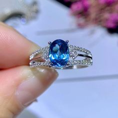 >>>> NATURAL TOPAZ RING <<<< Topaz size : 6*8 mm Topaz shape: Oval Cut gemstoneMain stone : blue topaz Side  stone : CZ diamond (cubic zircon)Metal color: silver, rose gold, gold  Metal type : 925 sterling silver,18k rose gold plated, 18K gold plated >>>> CUSTOM METALS <<<< Ring Size: From US #4 to US #14.Supply customized Solid Gold (18K White Gold/ Rose Gold/ Gold). Customize Engraved: Accept name or some simple icon on ring band. It's laser engr Blue Topaz Promise Ring With Prong Setting, Blue Open Topaz Promise Ring, Fine Jewelry Sapphire Ring In Light Blue, Blue Topaz Open Ring For Promise, Light Blue Sapphire Rings In Fine Jewelry Style, Blue Topaz Ring With Birthstone, Fine Jewelry Light Blue Sapphire Ring, Blue Topaz Birthstone Ring Fine Jewelry, Blue Topaz Cubic Zirconia Promise Ring