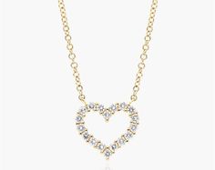 14K Yellow Gold Petite Heart Diamond Necklace. Crafted in 14K gold, this necklace will have you smitten for its sparkles. This versatile necklace can be worn at 16, 17 and 18 inches long. Heart Diamond Necklace, Heart Necklace Diamond, Diamond Necklaces, Heart Diamond, Cute Necklace, Stone Design, Gold Pearl, Diamond Heart, Silver Heart