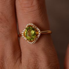 This is a gorgeous handmade creation. Its beauty is its simplicity & Elegance. The 6*8mm oval cut natural peridot is crafted in solid sterling silver and with yellow gold plated. All item is sent in a beautiful gift box You can realize more lovely stuff clicking the link https://www.etsy.com/shop/knightjewelry?refshopsection_shophome_leftnav Please leave the correct address and you phone number for delivering successfully. Luxury Oval Peridot Rings, Elegant Lime Green Gemstone Rings, Elegant Peridot Birthstone Ring In Yellow Gold, Oval Peridot Rings Fine Jewelry, Elegant Yellow Gold Peridot Birthstone Ring, Elegant Lime Green Oval Rings, Yellow Gold Peridot Jewelry With Halo Setting, Oval Peridot Birthstone Ring With Accent Stones, Oval Peridot Ring With Center Stone