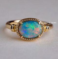 Gemstone  Natural Ethiopian opal Stone shape  Oval Band colors  Silver/ Gold /Rose gold  Silver purity  925 sterling  Style  Art Deco Ring For  Girls / Women Ring size  All Available  Our Business Policy   Shipping Time & Delivery Time:    Orders will be shipped between 4 to 7 days   Payment Terms :  We Accept Payment Through PayPal ONLY.   Return Policy:  *       You May Return Your Order Within 7 Days From The Date of Delivery. *       The Item Must be Returned In Its Original Condition. * Fine Jewelry Oval Cabochon Opal Ring, Fine Jewelry Rings With Ethiopian Opal Birthstone, Oval Cabochon Opal Ring Fine Jewelry, Oval Cabochon Opal Ring In Fine Jewelry, Fine Jewelry Ethiopian Opal Birthstone Rings, Ethiopian Opal Oval Rings For Anniversary, Oval Ethiopian Opal Birthstone Ring, Classic Ethiopian Opal Ring As A Gift, Classic Ethiopian Opal Gemstone Rings