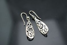 This is the perfect option for those who like cool, unique jewelry and the luxury, shine of silver. The pierced earrings have the shape of drops. The earrings have carved ornament. It is perfect for a gift for birthday, mother's day and holidays. ❤️ The earrings are about 1 2/4'' with loops by 3/8''(in the widest place). ❤️ There is a hallmark: 925. SU.Thailand. ❤️One earring is a little crumpled. Everyone interested in the jewelry should remember that he or she must like their jewelry- not just Ornament Earrings, Earrings Dangling, Yellow Gold Engagement, Sterling Jewelry, Earrings Drop, Pierced Earrings, Vintage Art Deco, Earings Piercings, Jewelry Earrings Studs