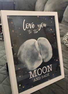 a sign that says i love you to the moon and back