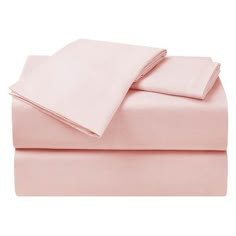 pink sheets and pillow cases on a white background