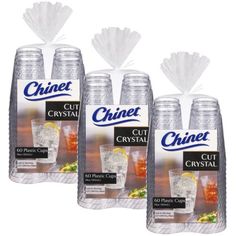 three bottles of cinet cut crystal ice tea on a white background with plastic bags