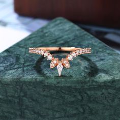 a close up of a ring on a marble surface