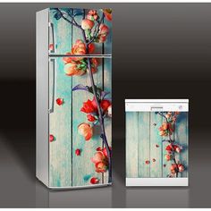 the refrigerator is decorated with flowers and leaves