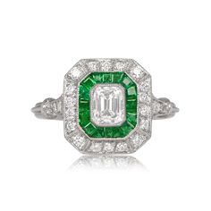 Newbury Ring - Estate Diamond Jewelry Green Brilliant Cut Platinum Halo Ring, Emerald Ring With Halo Setting In Platinum, Green Emerald Ring With Halo Setting In Platinum, Green Emerald Platinum Ring With Halo Setting, Green Platinum Halo Ring With Center Stone, Green Emerald Cut Halo Ring In Platinum, Green Emerald-cut Platinum Halo Ring, Classic Green Diamond Halo Ring, Gia Certified Emerald Cut Halo Ring