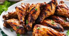 grilled chicken wings on a plate with parsley