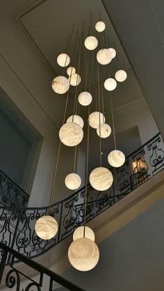 a chandelier hanging from the ceiling in a building