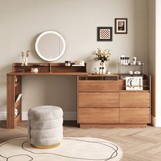 a wooden desk topped with a mirror and lots of drawers next to a white rug