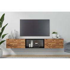 a flat screen tv mounted to the side of a wooden entertainment center in a living room