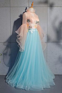 Blue Tulle Ball Gown For Homecoming, Blue Tulle Ball Gown For Prom, Blue Tulle Gown With Tulle Skirt, Blue Tulle Floor-length Ball Gown, Blue Tulle Gown For Homecoming, Light Blue Maxi Dress For Wedding And Prom Season, Blue Prom Gown With Tulle Skirt, Blue Tulle Skirt Prom Gown, Light Blue Tulle Ball Gown For Prom