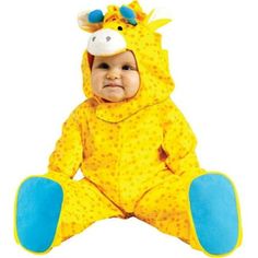 a baby in a yellow giraffe costume