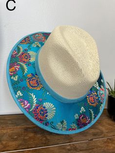 Medium Size Our hats are stylish and is completely unique in design, perfect to add that special touch to any outfit. Embroidered Wide Brim Summer Hat, Summer Embroidered Wide Brim Hat, Summer Wide Brim Embroidered Hats, Embroidered Summer Hat With Short Brim, Summer Embroidered Short Brim Hat, Embroidered Straw Hat With Curved Brim For Summer, Summer Embroidered Straw Hat With Curved Brim, Summer Brimmed Hats With Embroidery, Blue Embroidered Curved Brim Hats