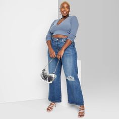 High-rise medium wash baggy jeans from Wild Fable™. Tailored in a boyfriend cut with a relaxed fit and distressed details. Crafted from cotton-blend denim with spandex for stretchy comfort. A belt-loop waistband with a zip fly and button fastening offers a secure fit. Classic front and back pockets complete the functional look. If you're not satisfied with any Target Owned Brand item, return it within one year with a receipt for an exchange or a refund. Wild Fable™: A look for every story. Best Jeans For Fupa, Plus Size Jeans Outfit, Wide Leg Baggy Jeans, Cropped Jeans Outfit, Boyfriend Cut, Curvy Fashionista, Summer Jeans, A Boyfriend, Wide Jeans