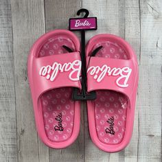 Barbie Women's Mattel Beach Slides Sandals Slip-On Logo Pink Size 6 New With Tag. Sandals In Photos Are The Exact One You Are Purchasing. Please Examine The Photos Entirely As They Are Part Of The Details. -Size: 6 -Color: Pink -Slip-On -Rubber Outsole Due To Variations In Phone Displays Or Computer Monitor Settings And The Light Brightness When Taking Photos, The Real Color Of The Item May Be Slightly Different From The Photos Shown. Message Me If You Have Any Questions! All Items Are Shipped T Eva Slip-on Sandals For Vacation, Summer Slip-on Synthetic Flip Flops, Non-slip Round Toe Flip Flops For Beach Season, Spring Beach Sport Sandals Made Of Eva, Flat Eva Sandals For Vacation, Closed Toe Jelly Sandals For Beach Vacation, Pink Open Toe Eva Slippers, Pink Eva Slip-on Slippers, Summer Eva Slide Slippers