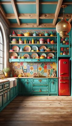 an old fashioned kitchen with green cabinets and colorful dishes on the shelves, along with wooden flooring