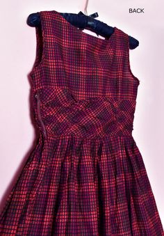 "🌸 RED PLAID SUN DRESS ------------------------------------------- Vintage cotton red & black dress from the 40's - 50's. Side metal red zipper, unlined. NO SIGNS IT WAS EVER USED. It's a small size. Unlined. Rich red & black colors.It has a slight deep red/purple on part of the design. 🌼I have LAY-A-WAY! - just ask CONDITION: Near Mint. No signs it was ever used. Still has paper tag. Hand washed in organic soap. LABEL: None SIZE: Small or XS BUST: 32\" - Fabric measures 16\" across wh Fitted Retro Vintage Dress For Picnic, Fitted Plaid Retro Vintage Dress, Fitted Retro Plaid Vintage Dress, Retro Plaid Fitted Vintage Dress, Retro Plaid Dresses For Vintage Fashion, Vintage Fitted Dress For Picnic, Red Retro Dress For Picnic, Retro Red Dress For Picnic, Fitted Rockabilly Dress For Party