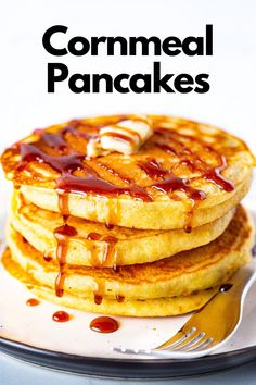 Stack of cornmeal pancakes. Topped with butter and drizzled with syrup. Cornbread Pancakes Easy, Vegan Cornmeal Pancakes, Corn Pancakes Recipe Easy, Corn Biscuits Recipe, Pancakes With Cornmeal, Corn Meal Pancake, Cornmeal Pancakes Pioneer Woman, Cornmeal Pancakes Recipe, Corn Meal Pancake Recipe