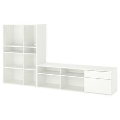 a white bookcase with two open shelves on each side and one closed shelf below